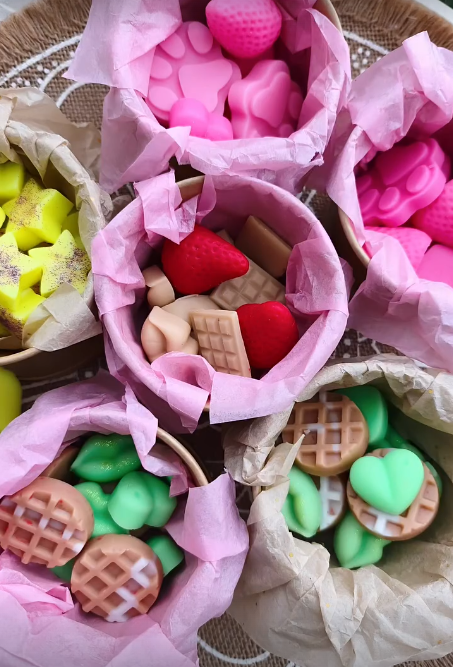 Wax Melts Cubos — cubos y figuras de cera en bolsitas.